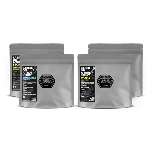 Four 250g coffee bags from Guatemala, Ethiopia and Brazil, showcasing diverse flavor profiles: chocolate, bright citrus acidity and a full body; chocolate, roasted almonds, apple; red apple, red fruits, cinnamon and cloves; caramel and chocolate